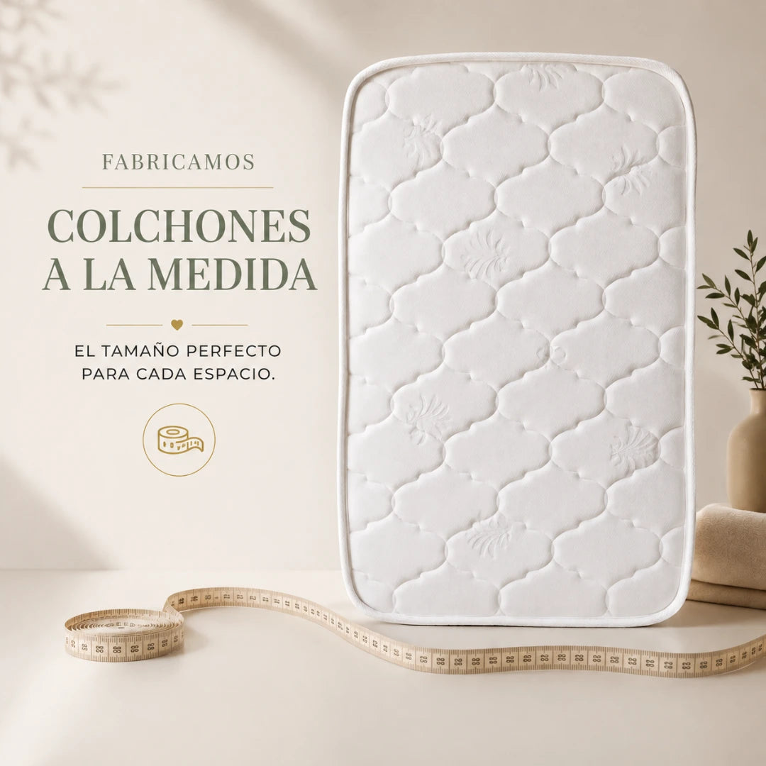 Colchón para bebé a la medida con acabado acolchado blanco y diseño premium para cunas, moisés y muebles infantiles.