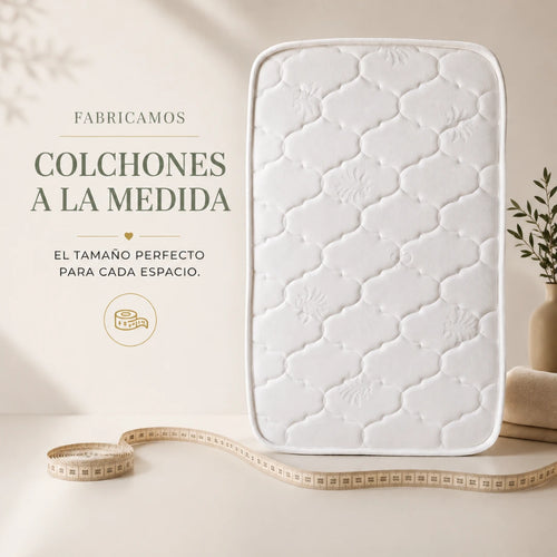 Colchón para bebé a la medida con acabado acolchado blanco y diseño premium para cunas, moisés y muebles infantiles.